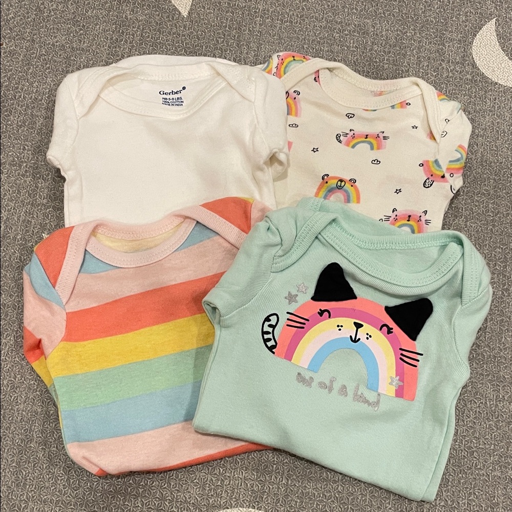 7 Gerber Baby Onesies, pants, and Pajama Bundle NB